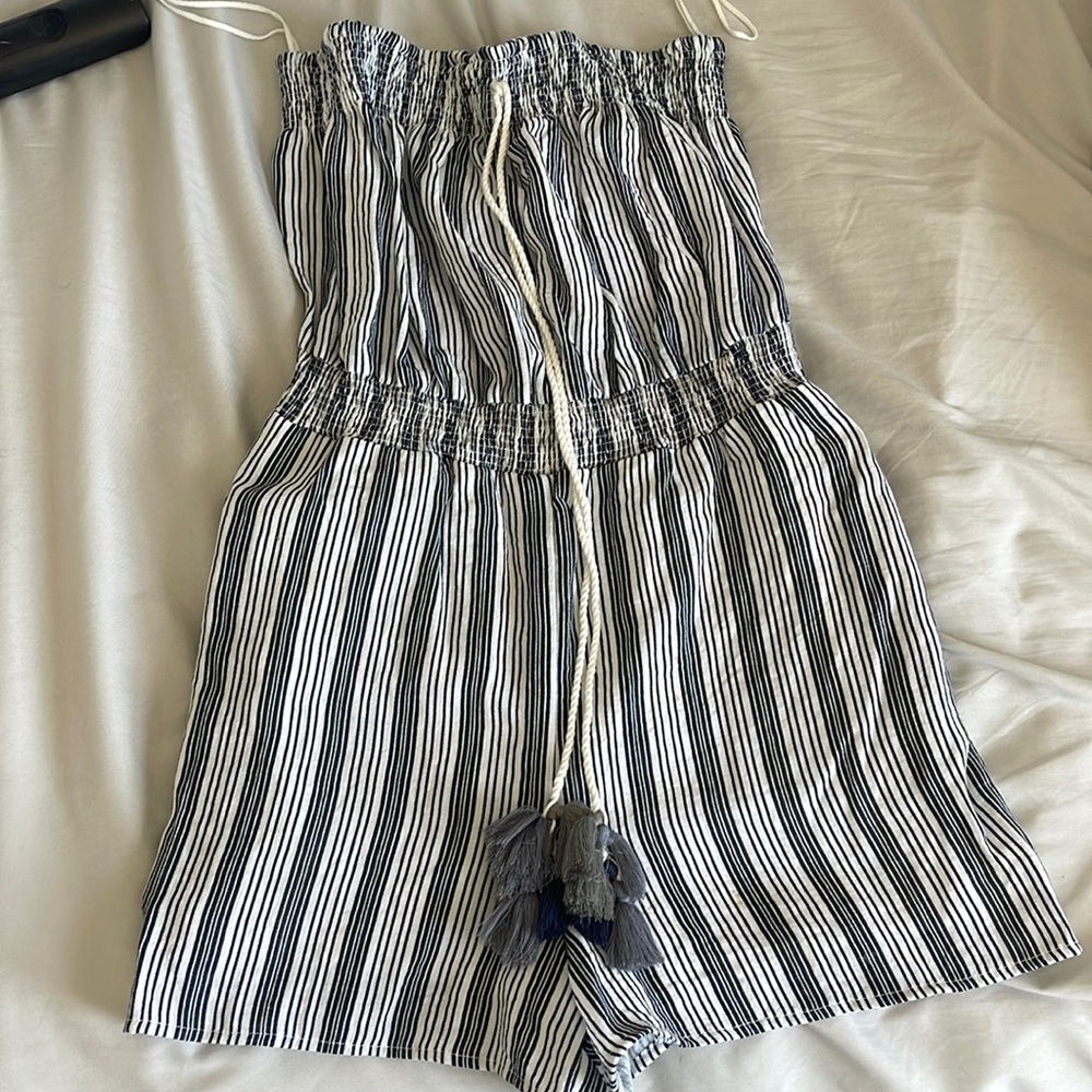 Blue and white striped romper with tassels